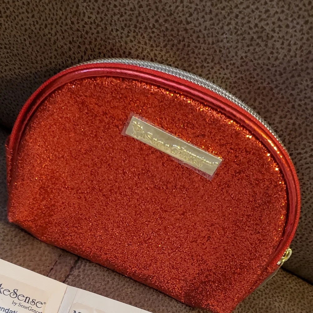 SeneGence red glitter makeup bag with foundation samples